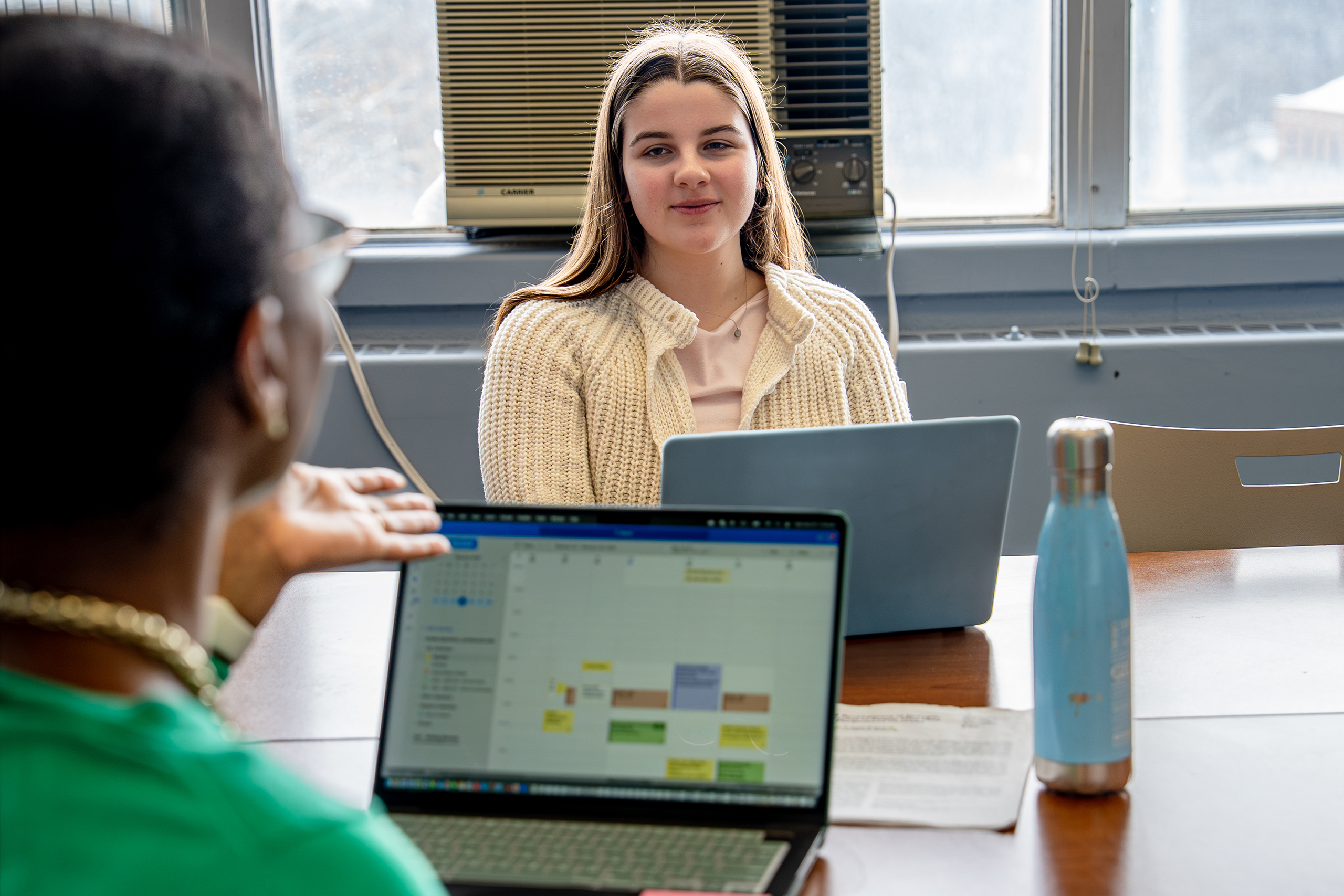 professor meeting with students